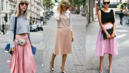 Hoe combineer je een roze rok?