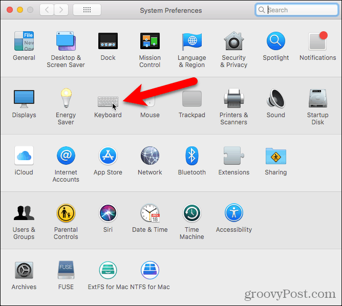 Klik op Toetsenbord in Systeemvoorkeuren op een Mac