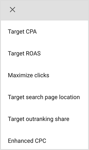Dit is een screenshot van een menu met targetingopties in Google Ads. De opties zijn Doel-CPA, Doel-ROAS, Aantal klikken maximaliseren, Locatie van doelzoekpagina, Overtreffingspercentage, Verbeterde CPC. Mike Rhodes zegt dat slimme targetingopties in Google Ads kunstmatige intelligentie gebruiken om mensen te vinden met de juiste intentie voor uw advertentie.