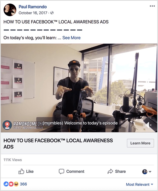 Paul Ramondo-vlog die op Facebook is gepost, heeft de tekst Hoe Facebook Local Awareness Ads te gebruiken. Onder deze titel staat de tekst Op de vlog van vandaag, je leert... De video toont Paul die achter een L-vormig bureau in een raamkantoor staat. Hij draagt ​​een baseballpet en een zwart T-shirt.