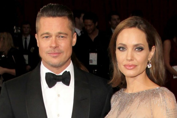 Angelina Jolie en Brad Pitt staan ​​tegenover elkaar